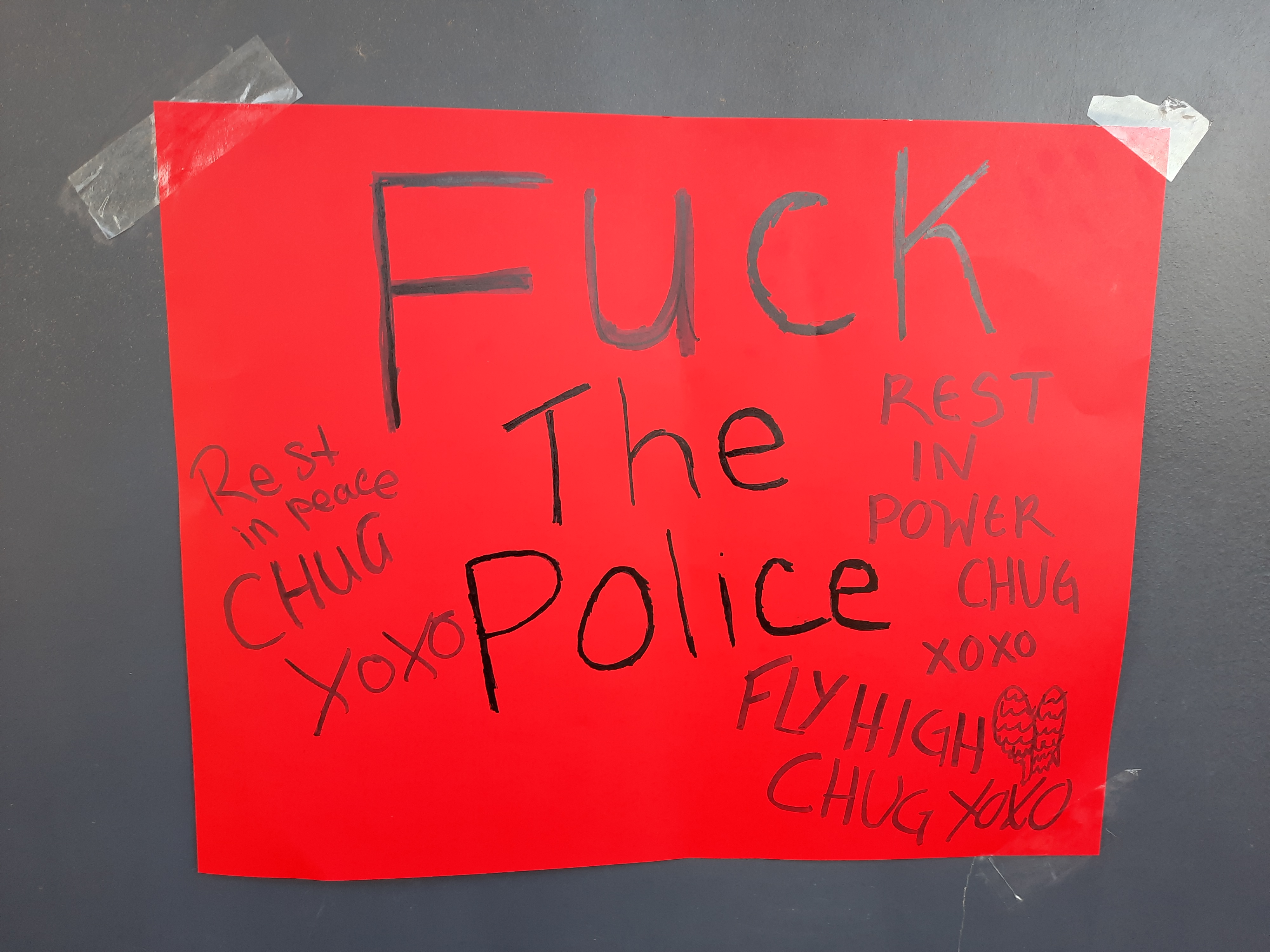 Poster saying Fuck the Police. Rest in Power. Fly high Chug.