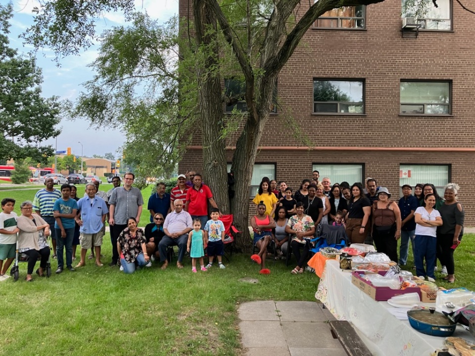 Tenants of 1570 Lawrence Ave. W. gather for a potluck to celebrate their victory at the Ontario Landlord and Tenant Board