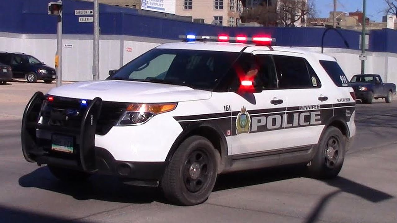 Winnipeg Police SUV with lights flashing.