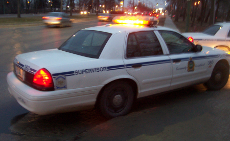 Winnipeg police car with lights flashing..
