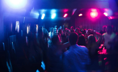 People dancing at a night club. Image: Maurício Mascaro, via Pexel