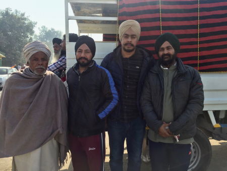  Satvant Singh (third from left) and Harsimran Singh (fourth from left) at Singhu before their departure. Photo: Vandana K
