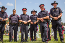 Calgary police officers, including Chief Mark Neufeld. 
