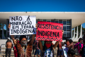 Indigenous people protest in Brasilia's Esplanade of Ministries against mining on their territories, June 2021. Photo: Cícero Pedrosa Neto/ Amazon Watch